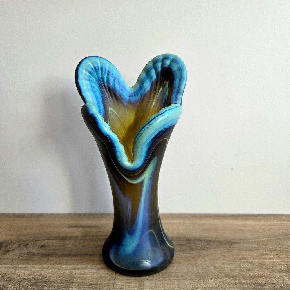Hand blown Phoenician art glass wavy ages vase.